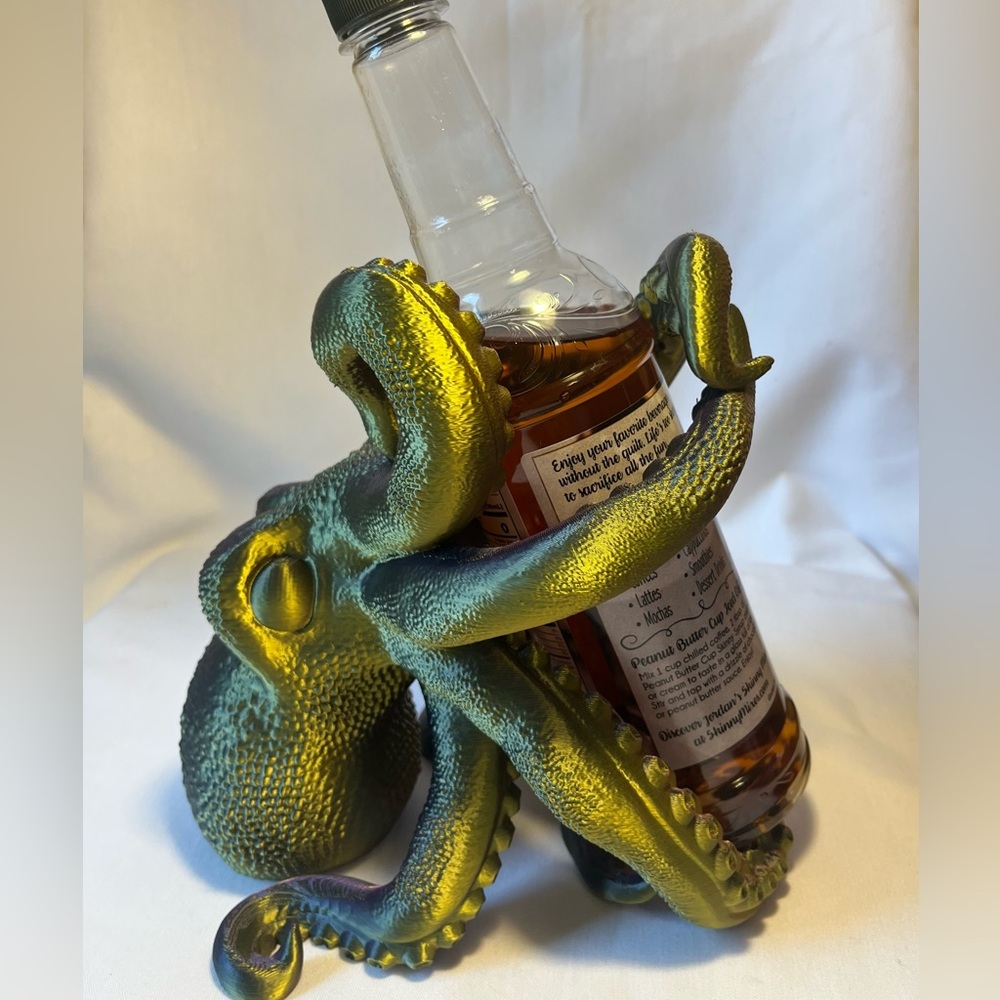 Gorgeous different 3D-printed octopus bottle holder,